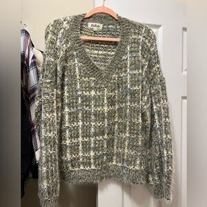 Green and cream sweater